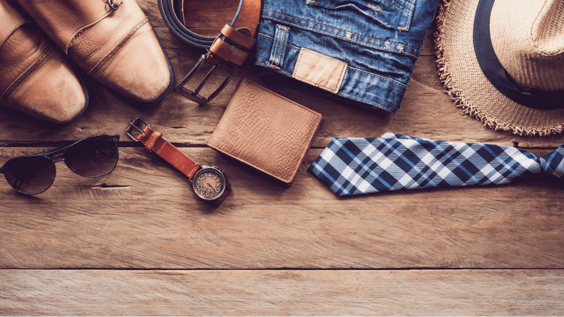 mens accessories on a wooden background